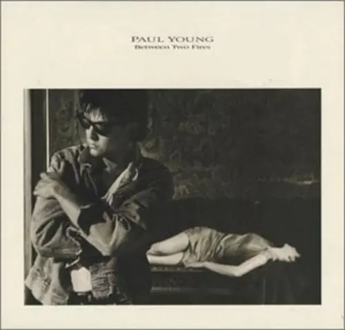 Paul Young - Between Two Fires 앞면
